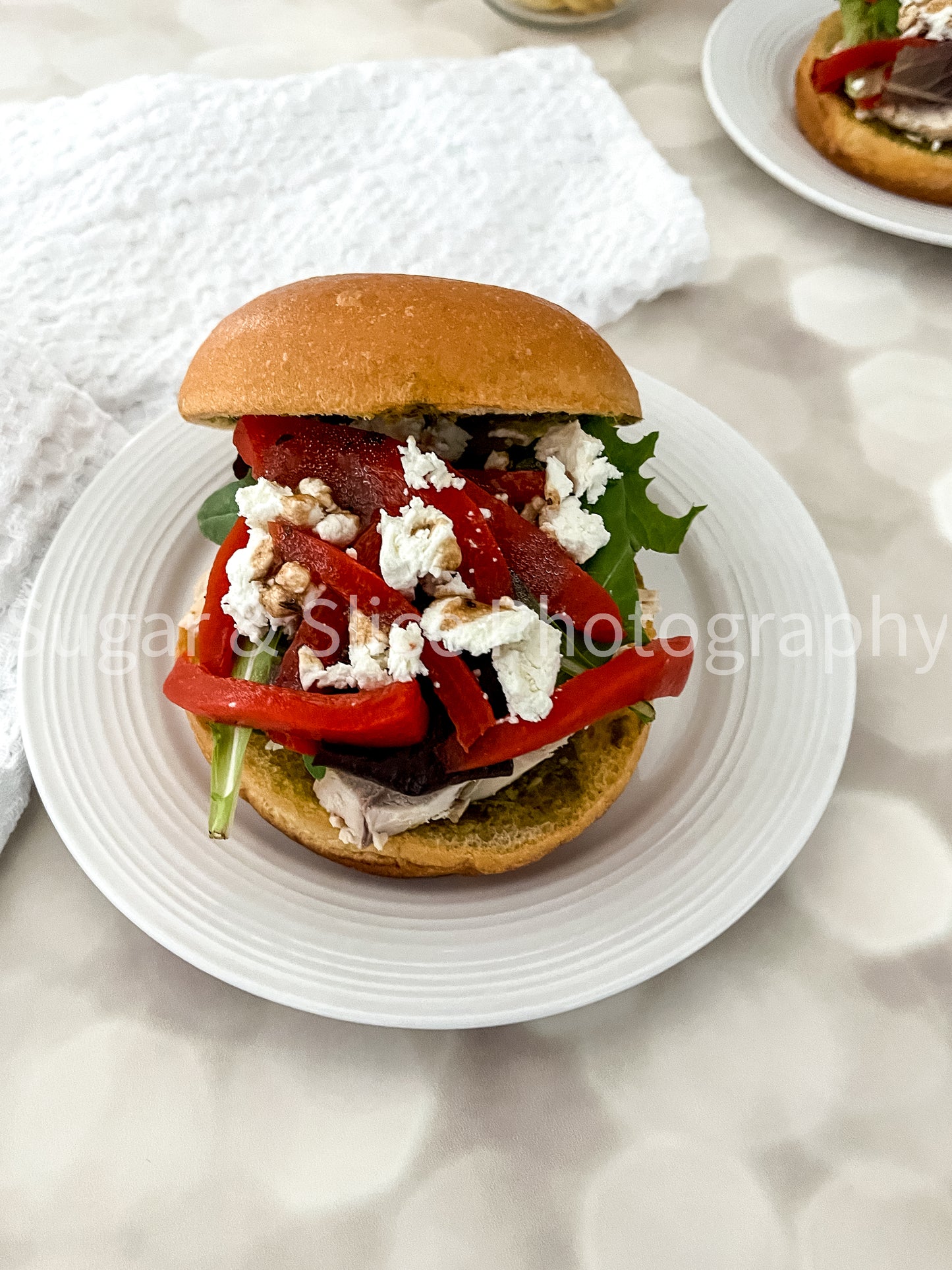 Mediterranean Chicken Sandwich on Lilac Ash Bokeh