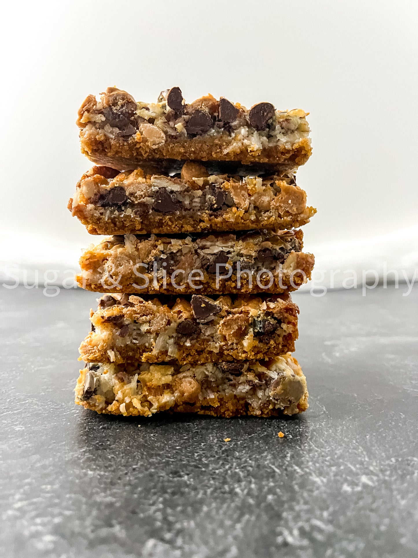 Magic Butterscotch Bars on Black Slate