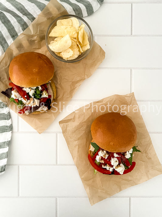 Mediterranean Chicken Sandwich on White Ceramic Subway Tile